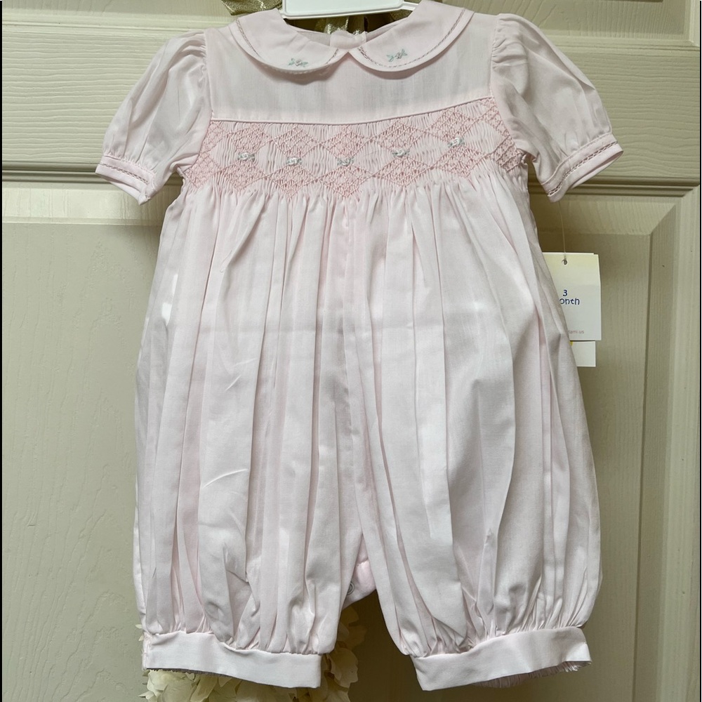 New baby romper with tag. Size: 3 months